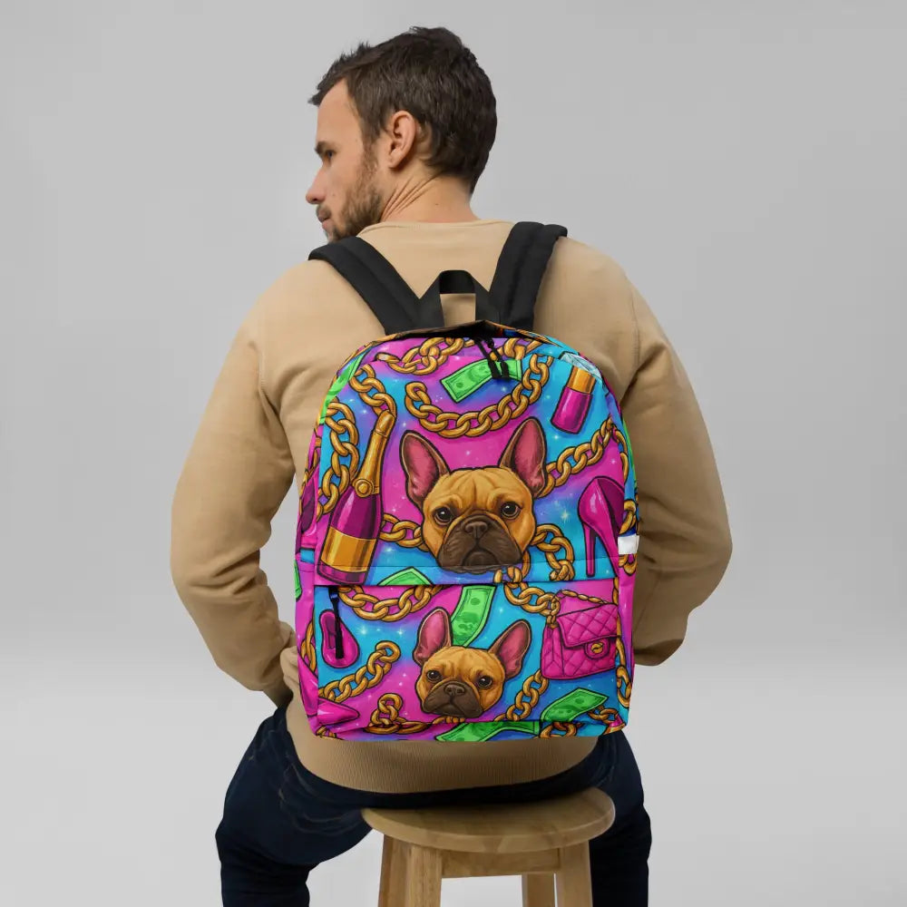 man wearing luxury glam backpack with colorful French bulldog print chains cash high heels and champagne design
