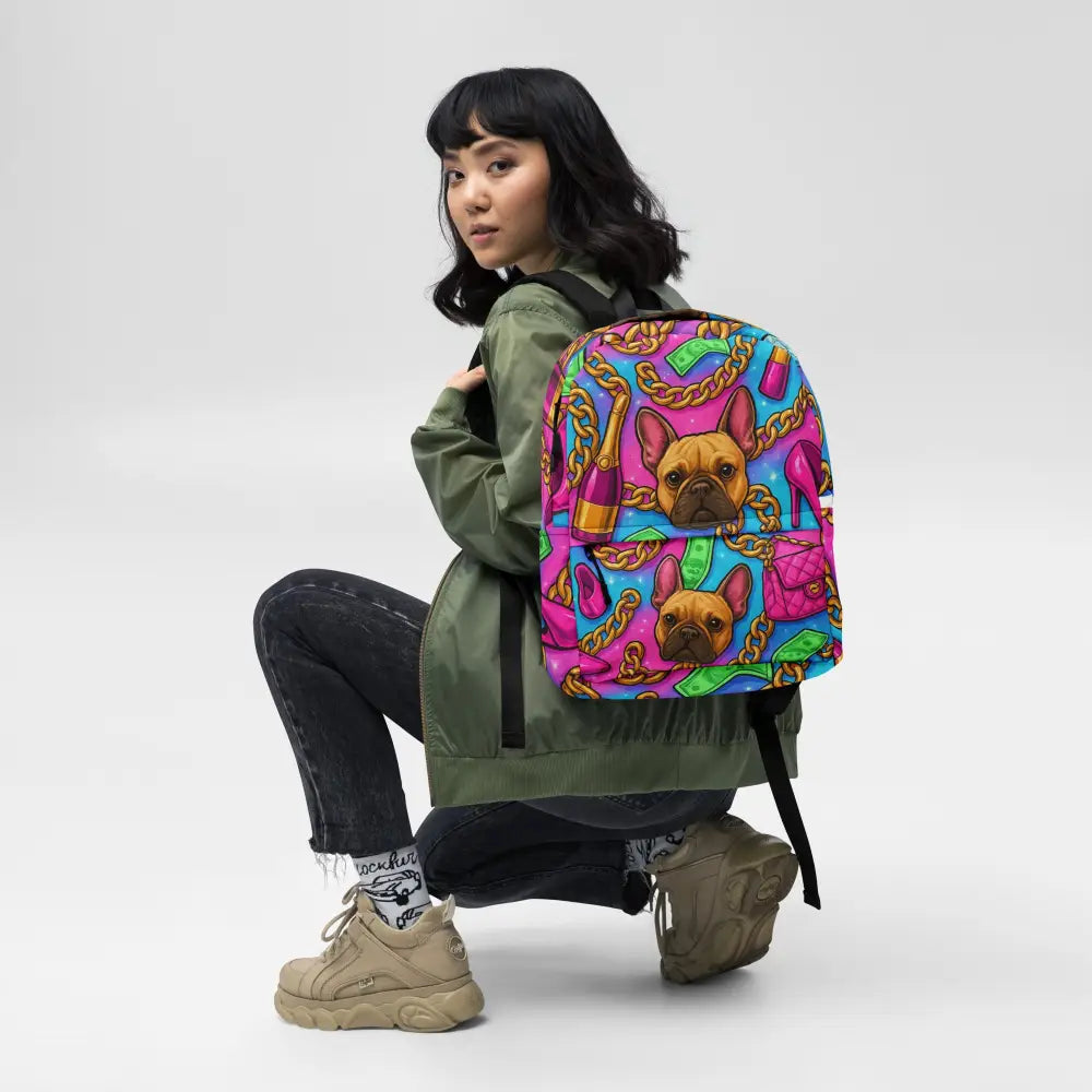 Luxury Glam Backpack with colorful French Bulldog print, gold chains, and high heel motifs, worn by woman in casual outfit